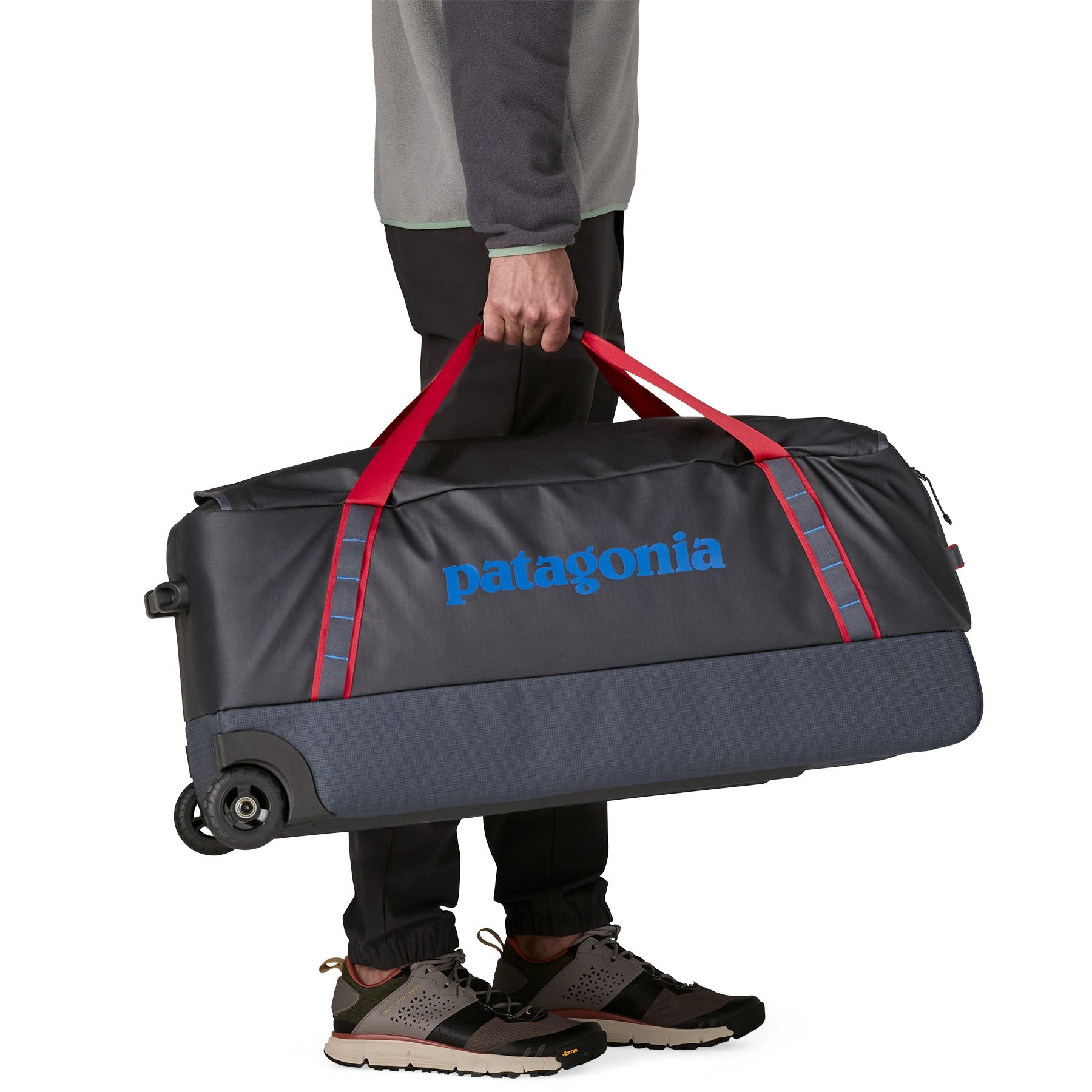 Black Hole Wheeled Duffel 100L in Smolder Blue w/Amanita Red | Patagonia Bend