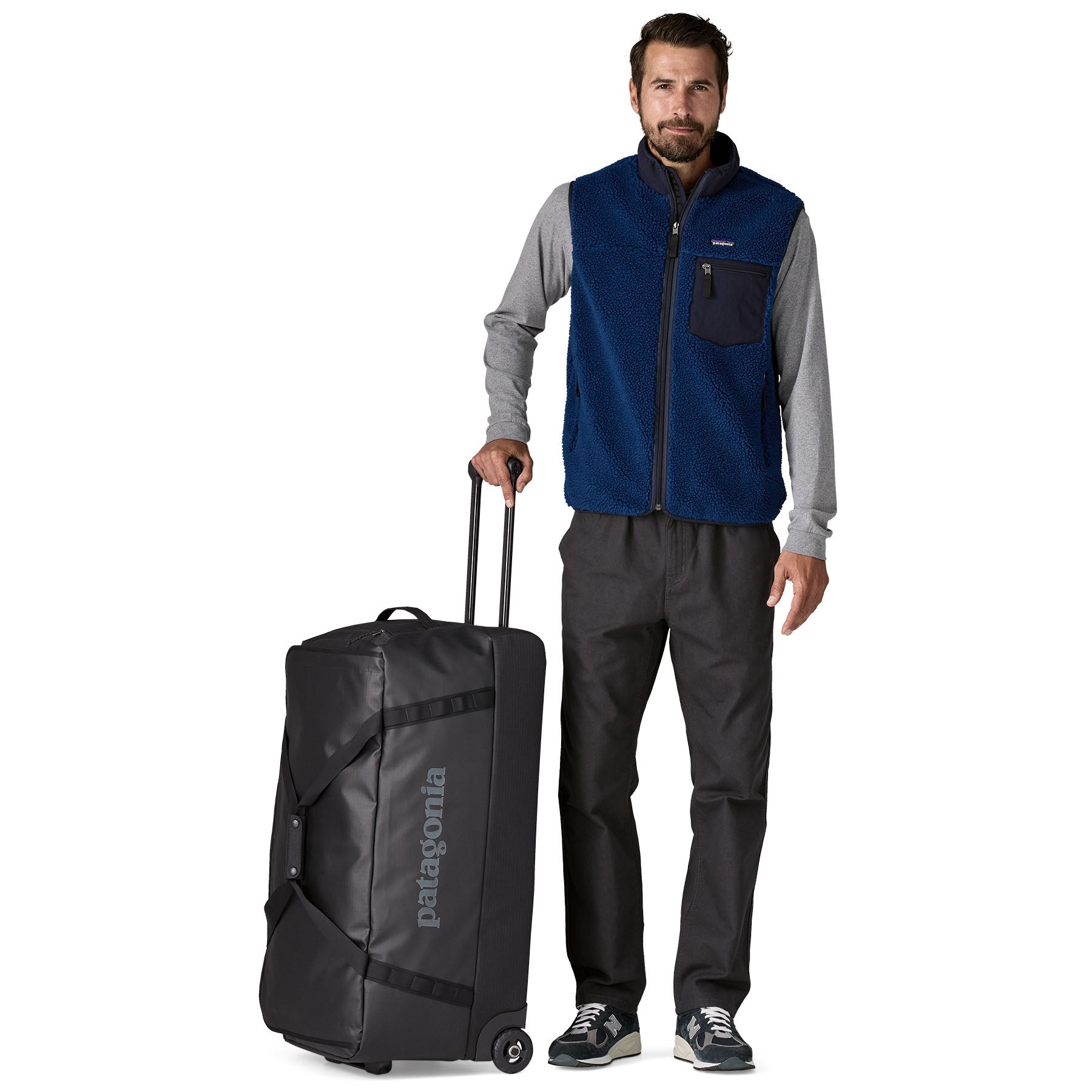 Black Hole Wheeled Duffel 100L in Black w/ Black | Patagonia Bend