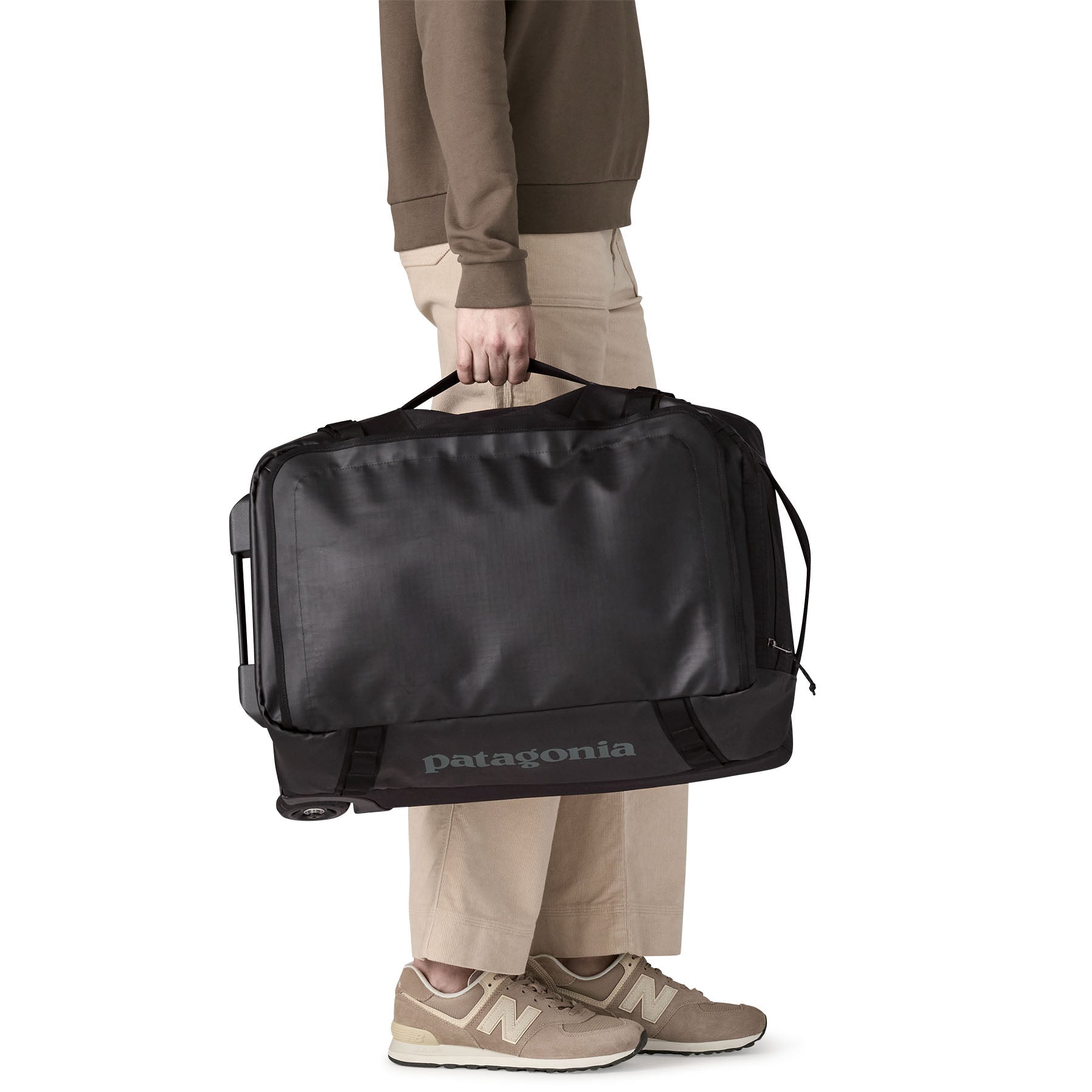 Black Hole® Wheeled Duffel 40L in Black w/ Black | Patagonia Bend