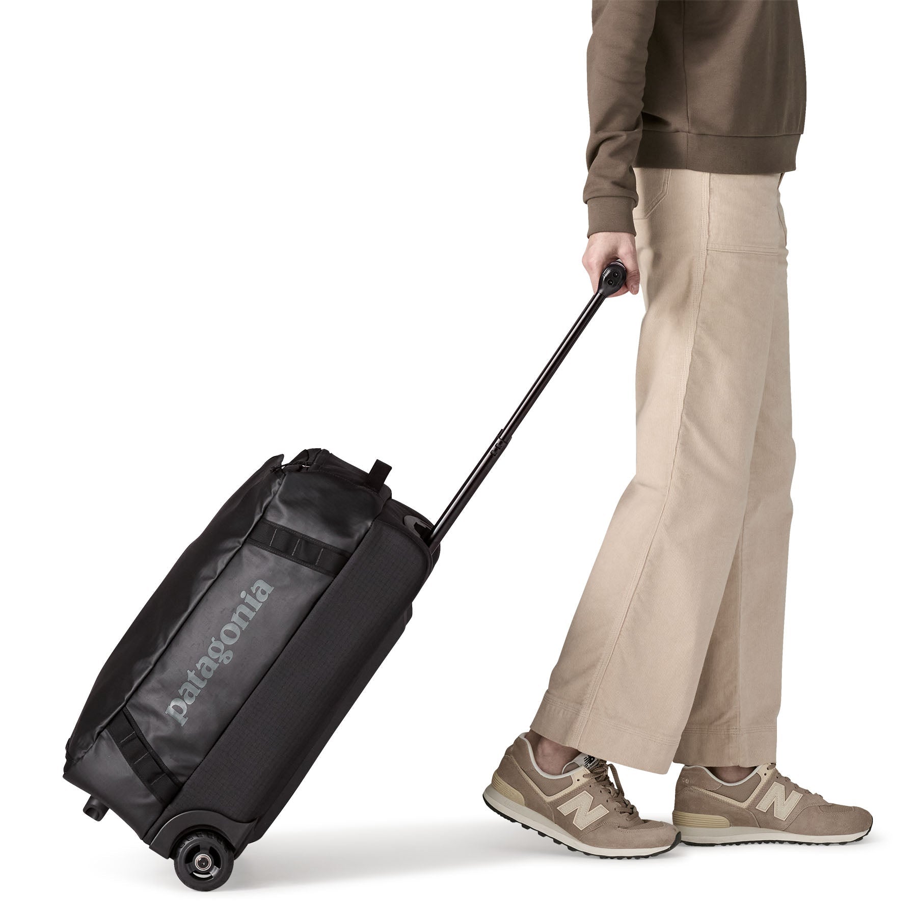 Black Hole® Wheeled Duffel 40L in Black w/ Black | Patagonia Bend