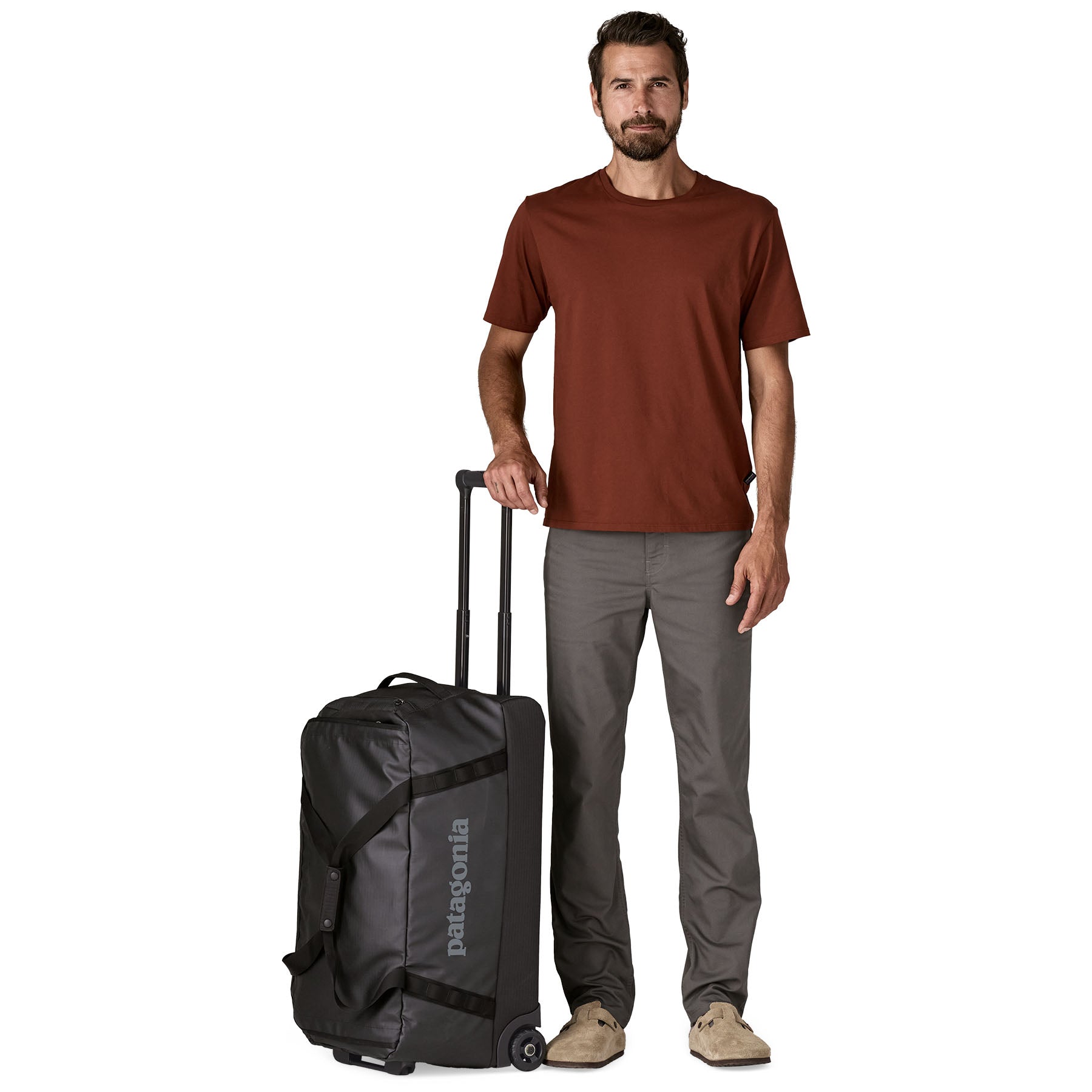 Black Hole Wheeled Duffel 70L in Black w/ Black | Patagonia Bend