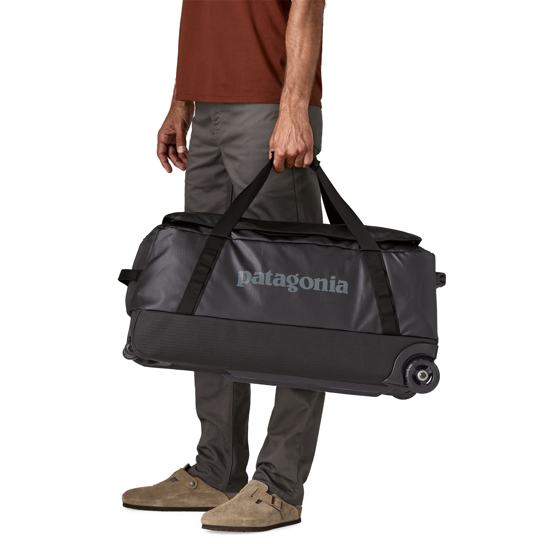 Black Hole Wheeled Duffel 70L in Black w/ Black | Patagonia Bend